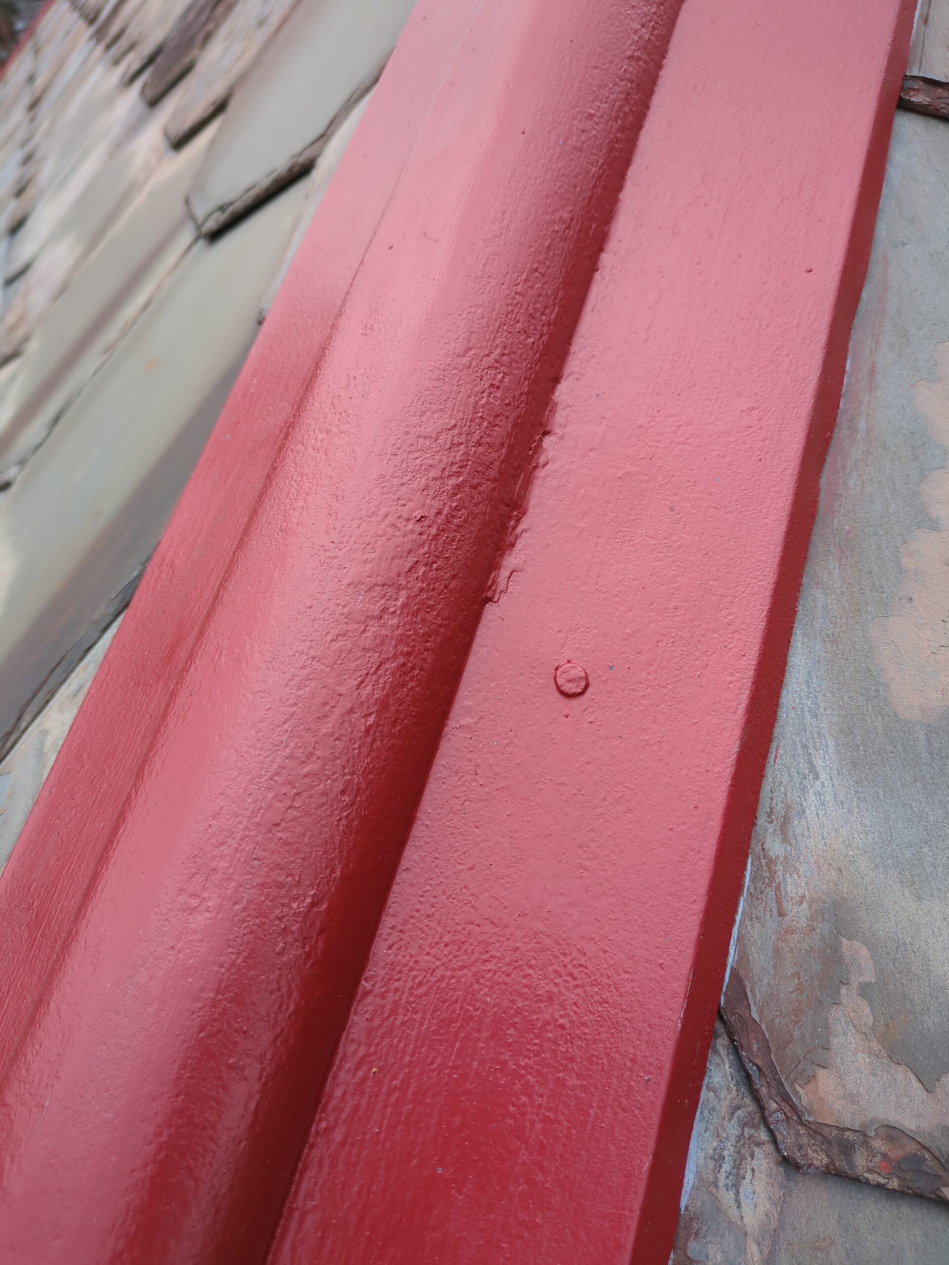 ridge roll painting on slate roof Slate Roof Repair